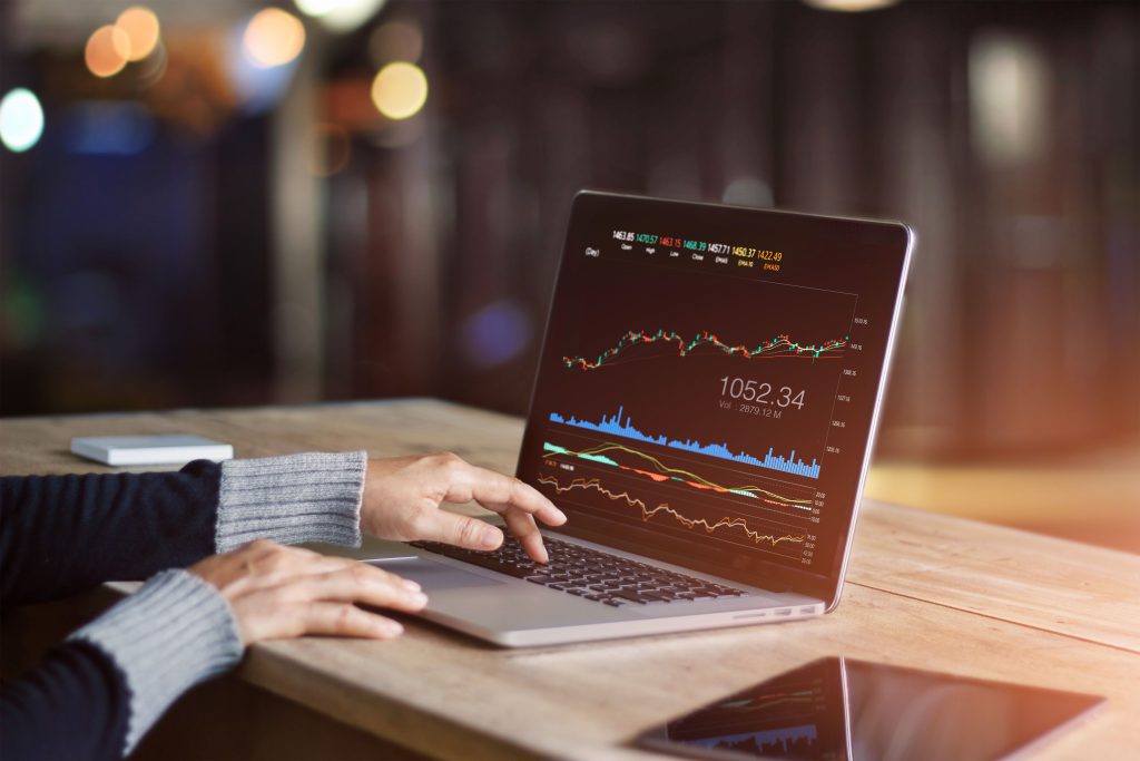 businessman-using-laptop-for-analyzing-data-stock-market--forex-trading-graph--stock-exchange-trading